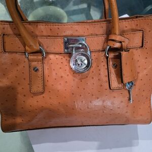 Michael Kors Orange Satchel with Silver Accents